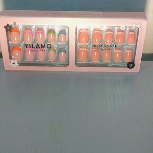 Yilamo nail art. 2 sets in a box. Regular French tips and different color tips.